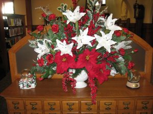 A bouquet on an old card catalog.
