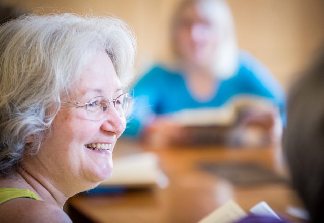 A picture of a lady smiling.