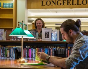 A picture of a guy reading.