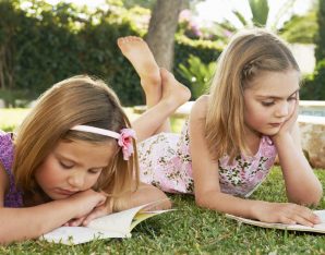 A picture of two girls reading.