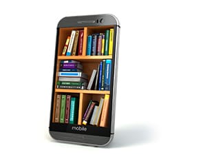 A picture of a mobile phone with books in it.