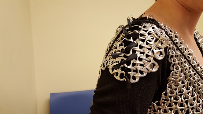 Shoulder guard of a shirt of armor made out of bottle tabs