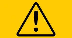 Yellow Warning signal on a Yellow background