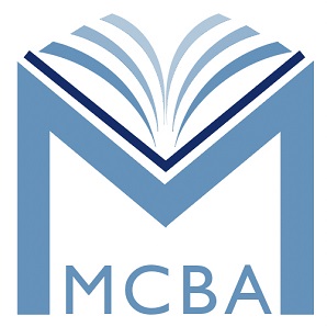 Blue M with the letters MCBA under it and pages of a book coming out of the middle of the M