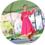 Woman in pink dress dancing