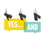 Three stage lights above the words Yes... And