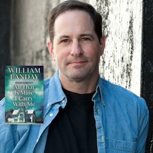 Cover of All That is Mine I Carry With Me on top of a photo of a pale skinned brown haired man in a black shirt and denim pull over