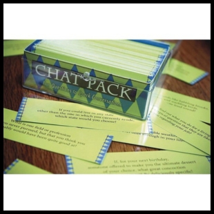 Green and blue cards in a clear box with the words Chat-Pack on the front