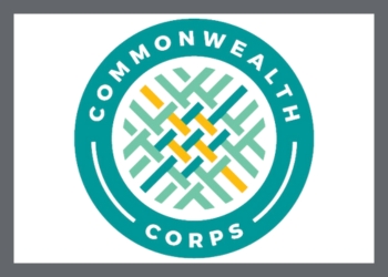 Green and yellow circular Commonwealth Corps logo