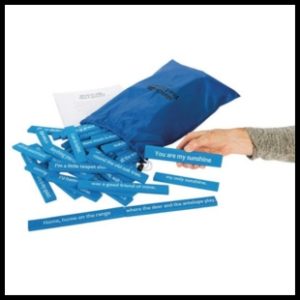 Blue bag with blue strips with white words spilling out of it