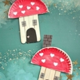 Red and tan popsicle fairy houses