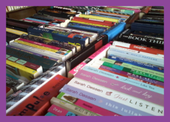 Table full of multicolored books