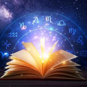 Open book with glowing symbols above it
