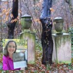 Reading the Stones 654 Two tall moss covered grave markers with trees between them. Inset a woman in a pink shirt
