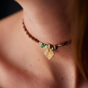 A macrame necklace on a light skinned neck