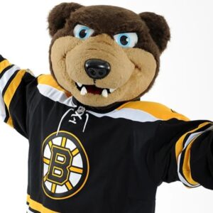 Blades the Bruins mascot in a Boston Bruins sweater with his arms out to the sides