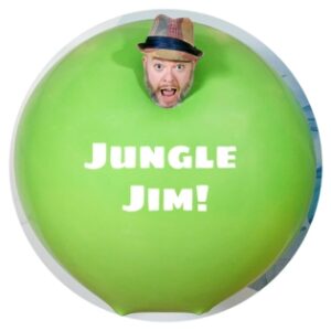 Light skinned man's head with a hat on it sticking out of a green ball with the words jungle jim on it