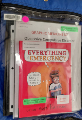 Graphic Medicine Kit in a blue bag with the book Everything is an Emergency showing in its clear front