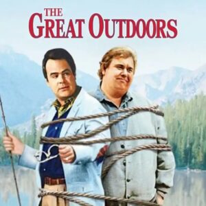 Two light skinned men wrapped together with a rope, one holding a fishing pole, and both in front of a lake and mountain