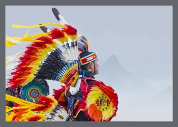 Man in Native American garb made of mostly red and yellow looking off to the right