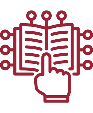 Hand with index finger pointing towards a book that has circuit looking things coming out of it