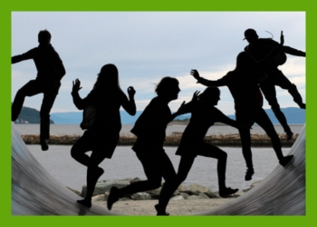 Shadows of children running in a pipe