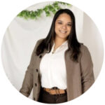 Tiaartstudio315 Smiling tan skinned brunette in a white shirt and blazer