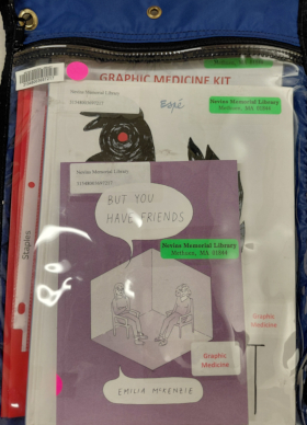 Blue kit bag with But you have friends book at the front and words graphic medicine kit above